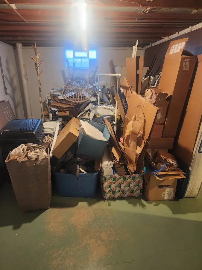 Roll-off dumpster container at job site for 2 Yard Dumpster Rental in Melissa